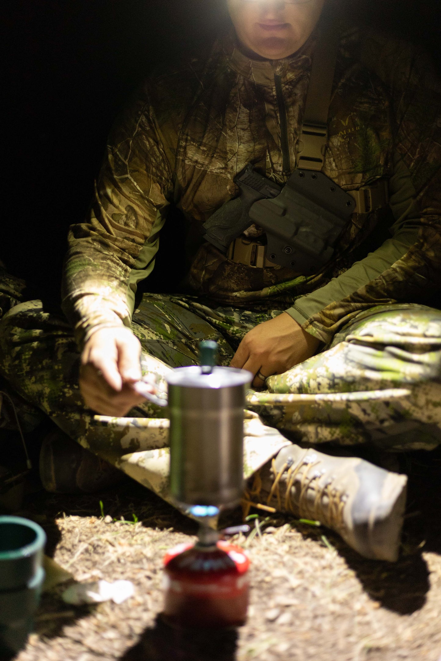 Late nights in the backcountry heating up water while staying protected against bears and other wild animals.