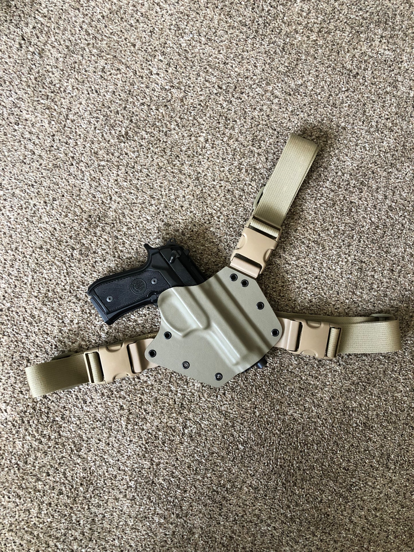 Beretta m9 service pistol in an Arctos Arms Chest rig holster for sale
