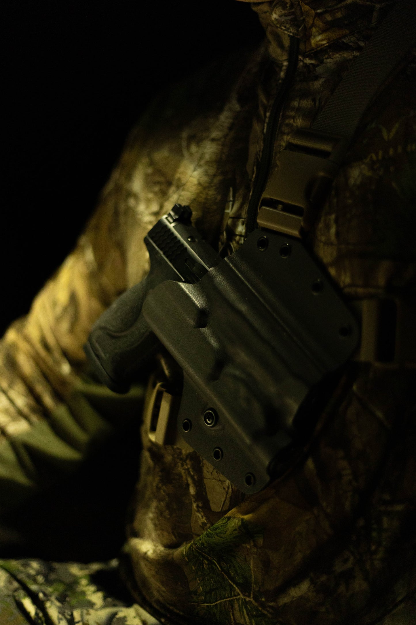 A hunters best protection from bears is 10mm, a dim light illuminating his arctos arms chest holster. Can you use a chest holster under a bino harness? Answer: YES