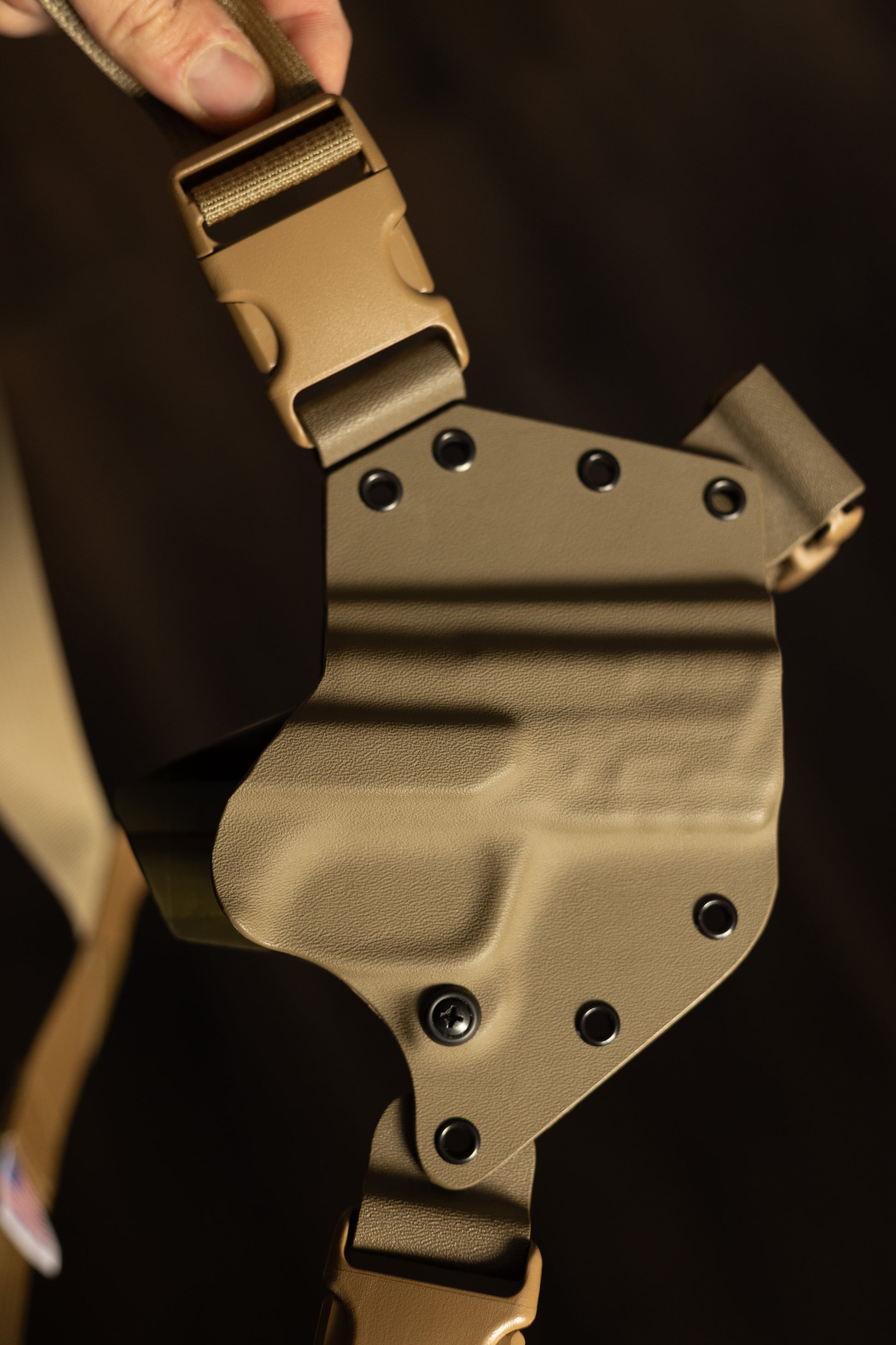 The best bear protection holster, arctos arms chest holster pictured here in FDE tan.