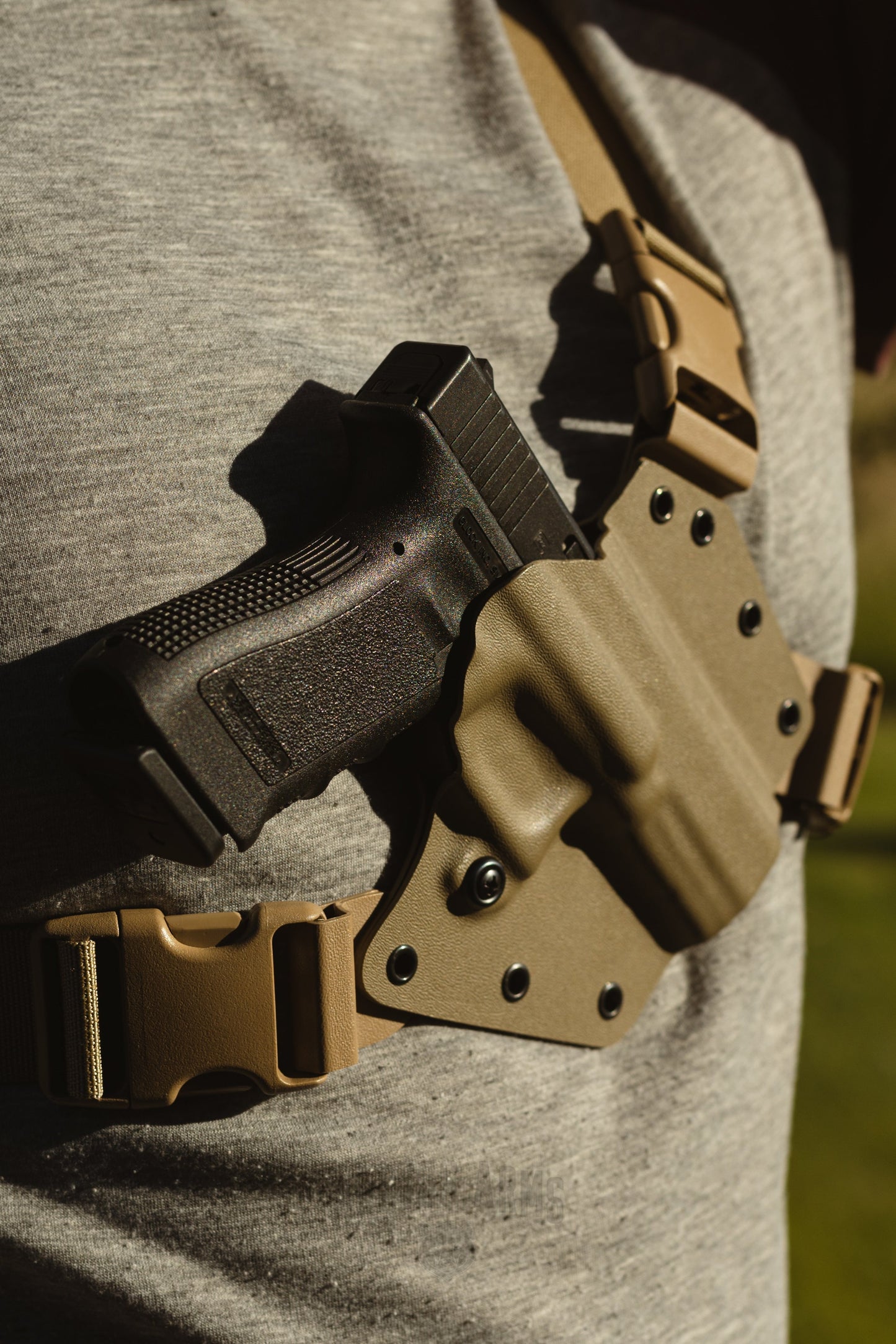 Arctos Arms chest holster for glock full sized pistols in FDE tan, with FDE tan harness.